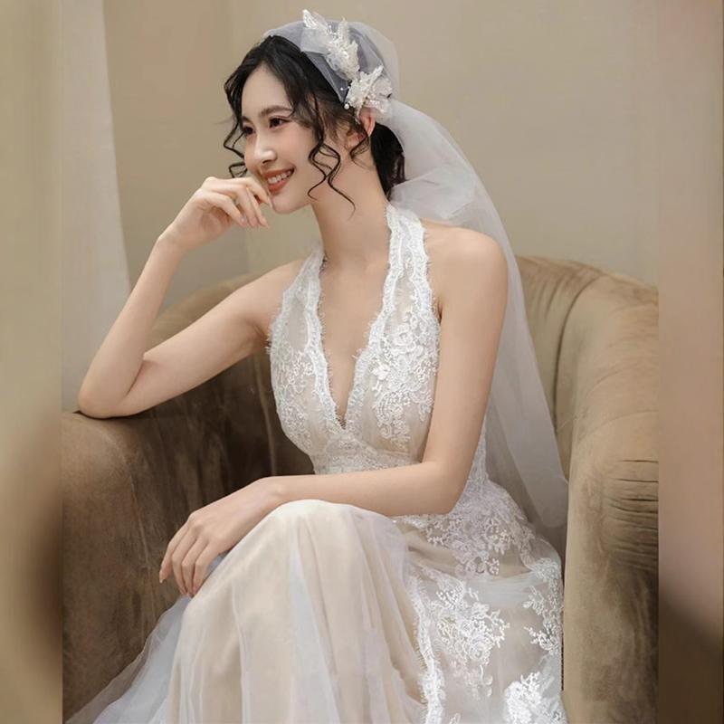 Low-cut lace gown, wedding dress....