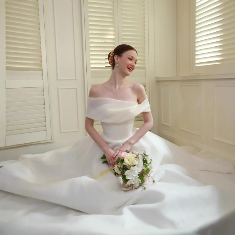 French-style off-the-shoulder wedding dress--