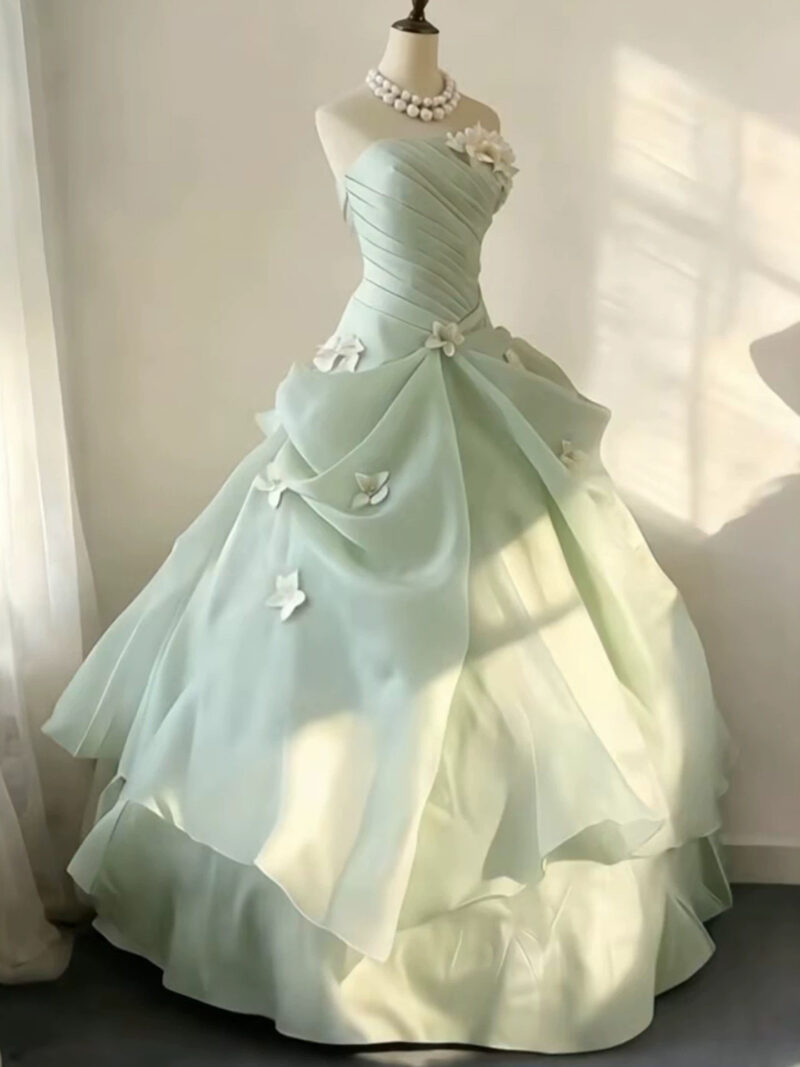 Off-the-shoulder full-length evening gown with a voluminous skirt