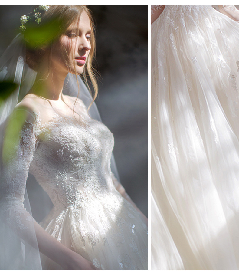 Voluminous long-sleeved lace wedding dress