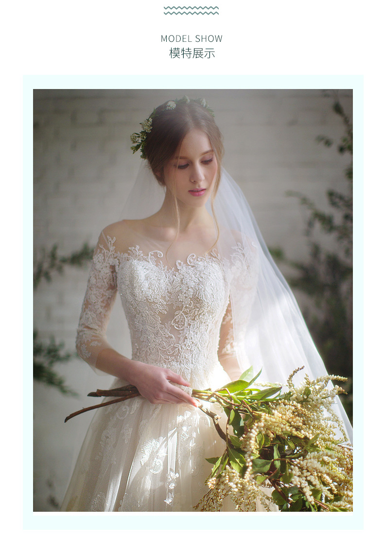 Voluminous long-sleeved lace wedding dress