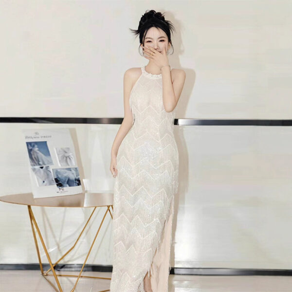 Silver form-fitting shimmering gown....