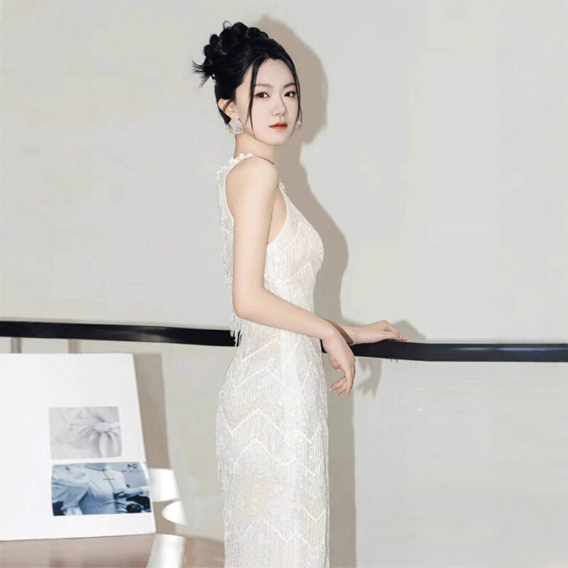 Silver form-fitting shimmering gown....