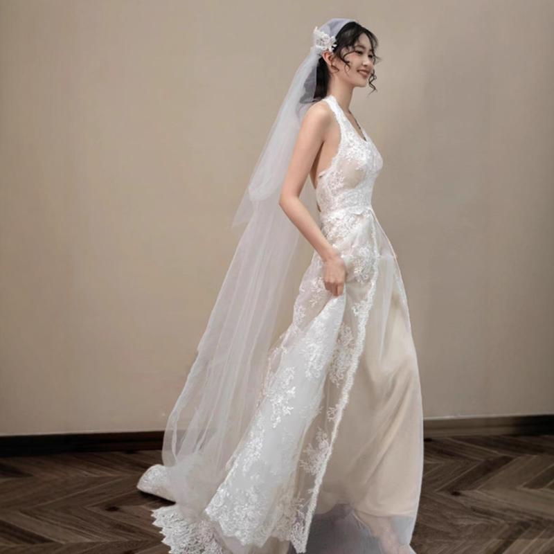 Low-cut lace gown, wedding dress....