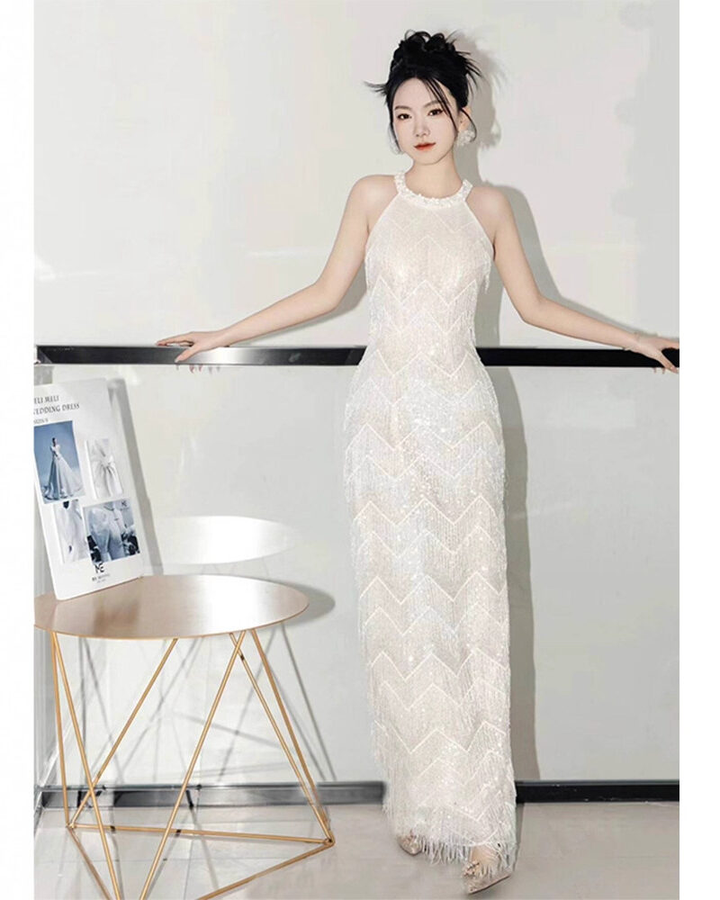 Silver form-fitting shimmering gown....