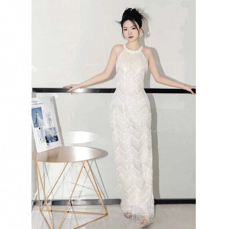 Silver form-fitting shimmering gown....