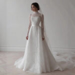 Long-sleeved lace wedding dress with a high neck wedding dress