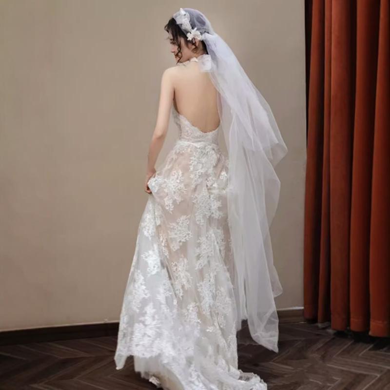 Low-cut lace gown, wedding dress....