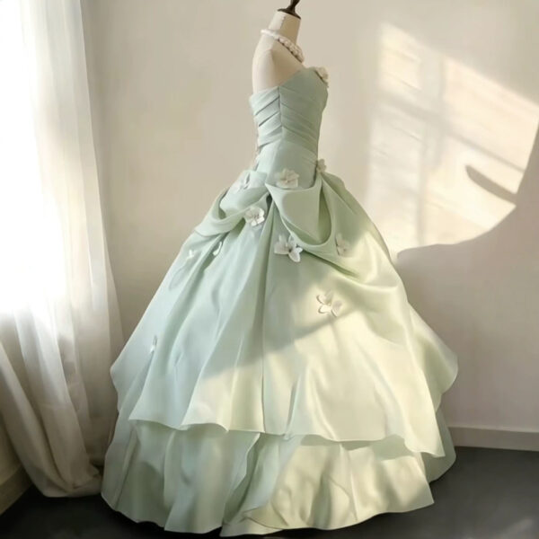 Off-the-shoulder full-length evening gown with a voluminous skirt