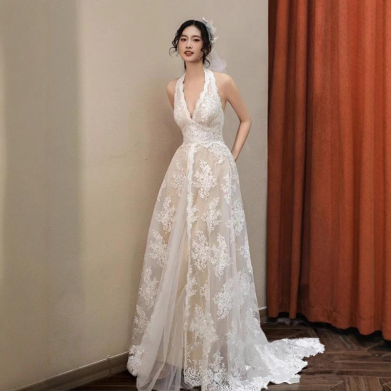 Low-cut lace gown, wedding dress....