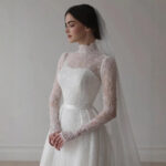 Long-sleeved lace wedding dress with a high neck wedding dress