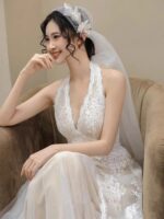 Low-cut lace gown, wedding dress....