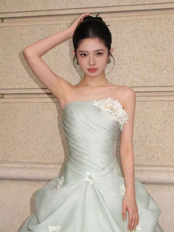 Off-the-shoulder full-length evening gown with a voluminous skirt