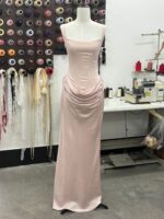 Boned, form-fitting lace-up design with drawstring