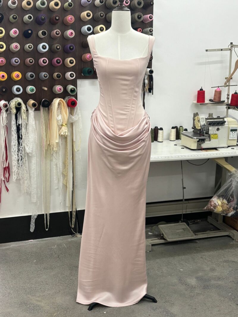 Boned, form-fitting lace-up design with drawstring