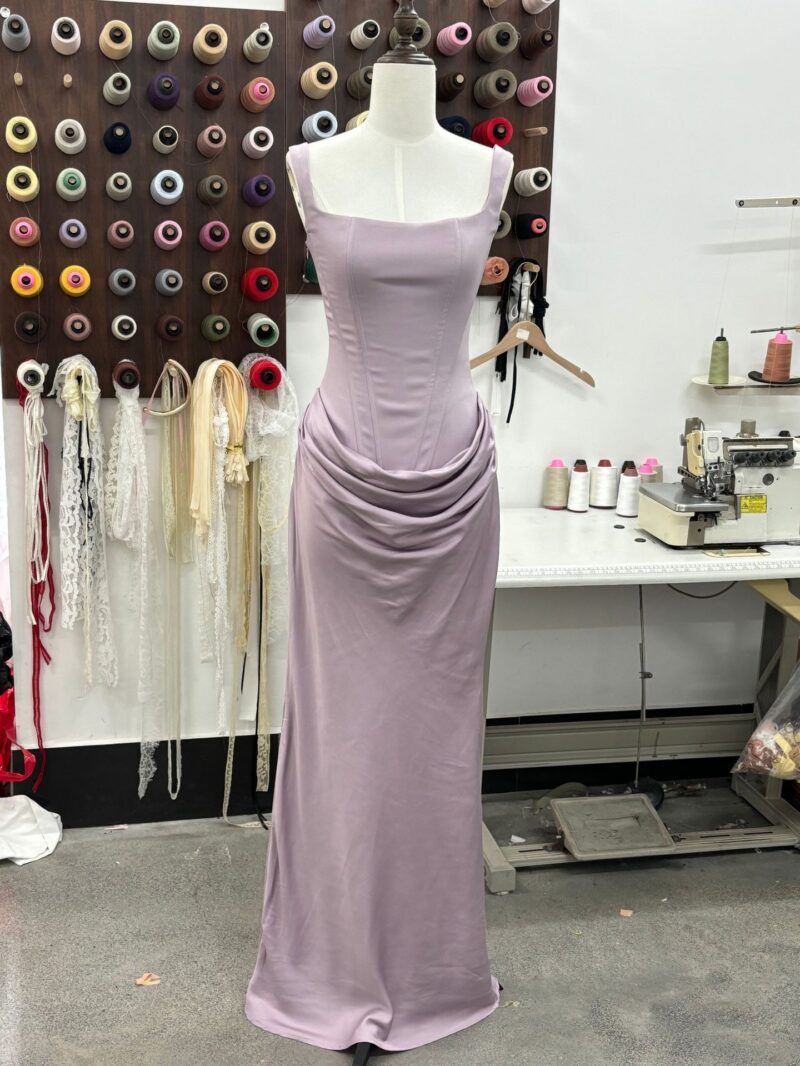 Boned, form-fitting lace-up design with drawstring