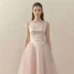 White sleeveless evening gown for young women