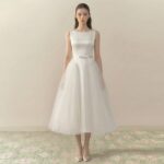 White sleeveless evening gown for young women