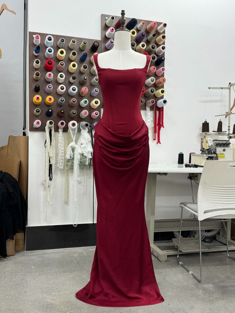 Boned, form-fitting lace-up design with drawstring