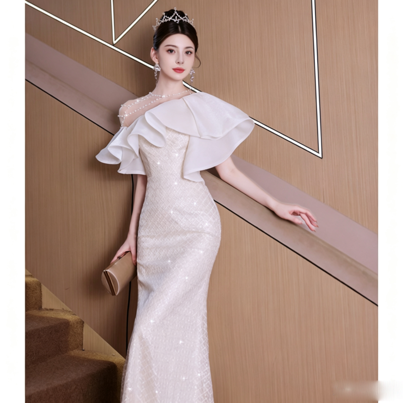 Elegant French-style white fishtail gown.
