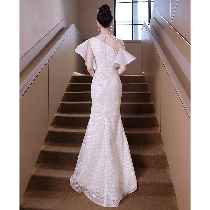 Elegant French-style white fishtail gown.