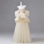 Double-layered, three-dimensional design performance gown