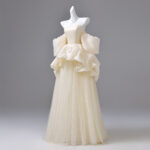Double-layered, three-dimensional design performance gown