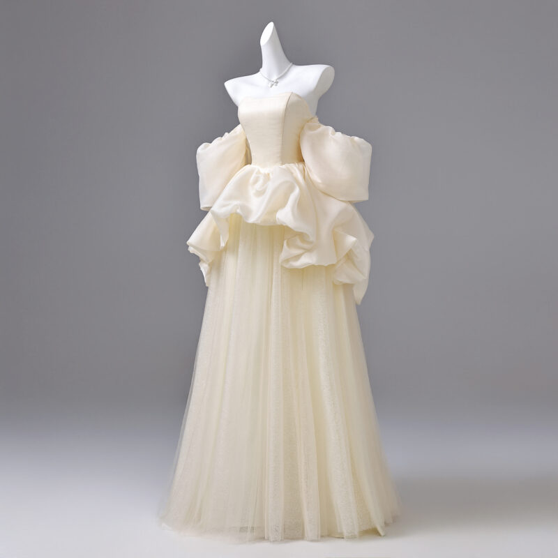 Double-layered, three-dimensional design performance gown