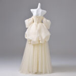 Double-layered, three-dimensional design performance gown