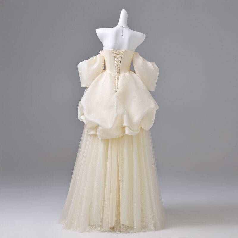 Double-layered, three-dimensional design performance gown