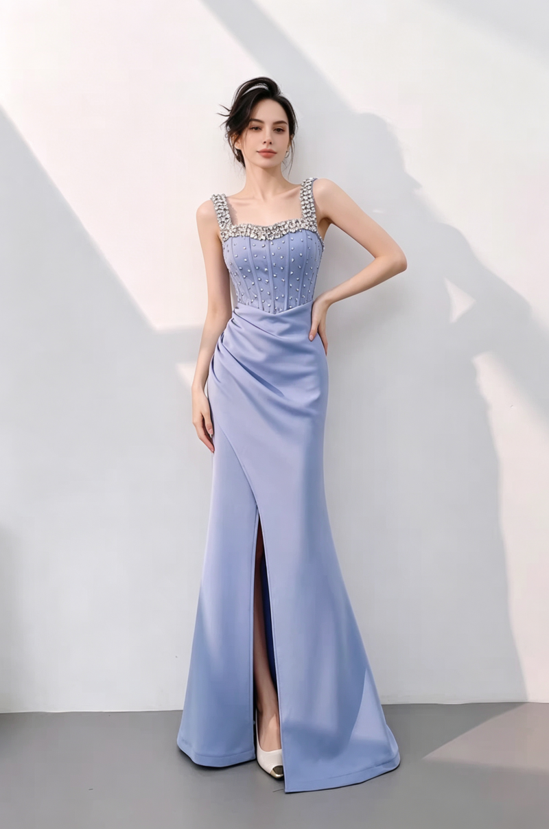 Form-fitting gown with wide straps and shimmering detail