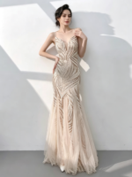 A shimmering, silver, mermaid-style gown