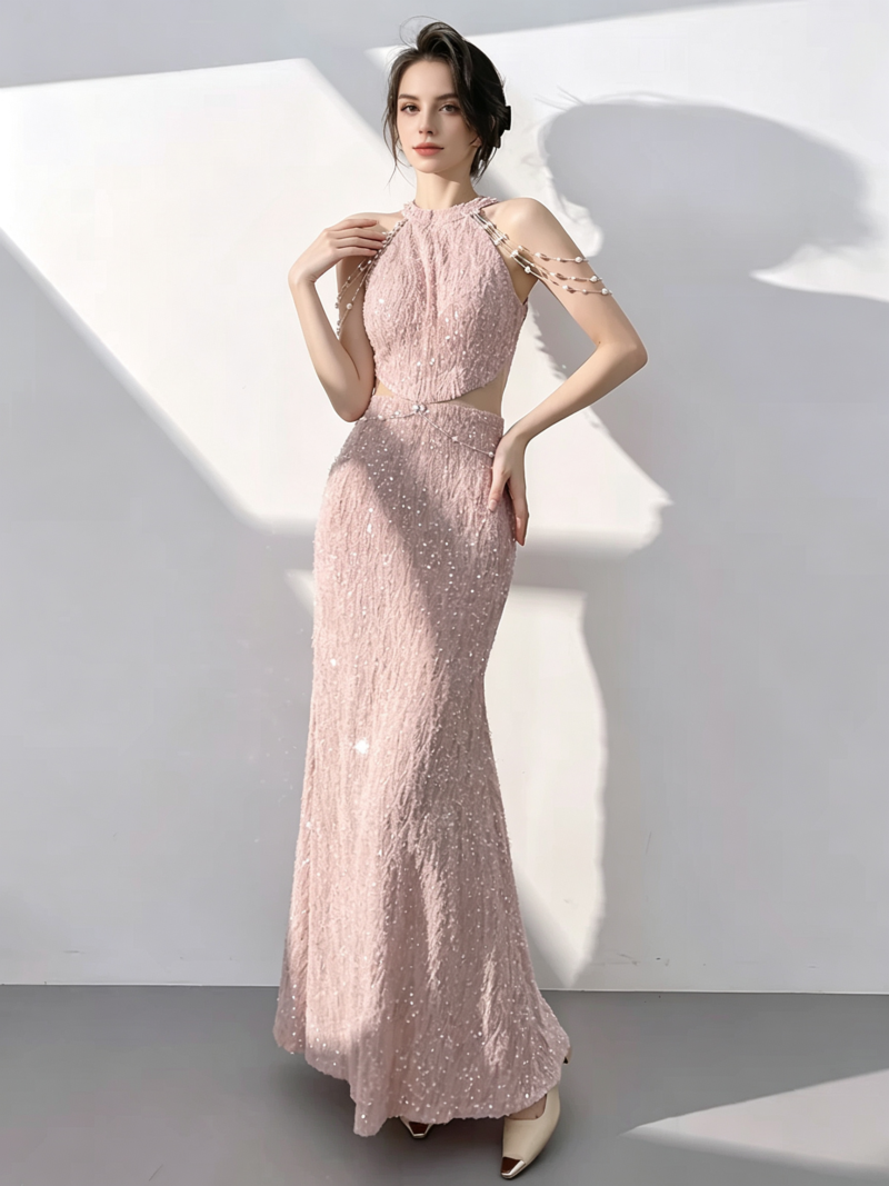 Pink halter-neck, waist-baring evening dress