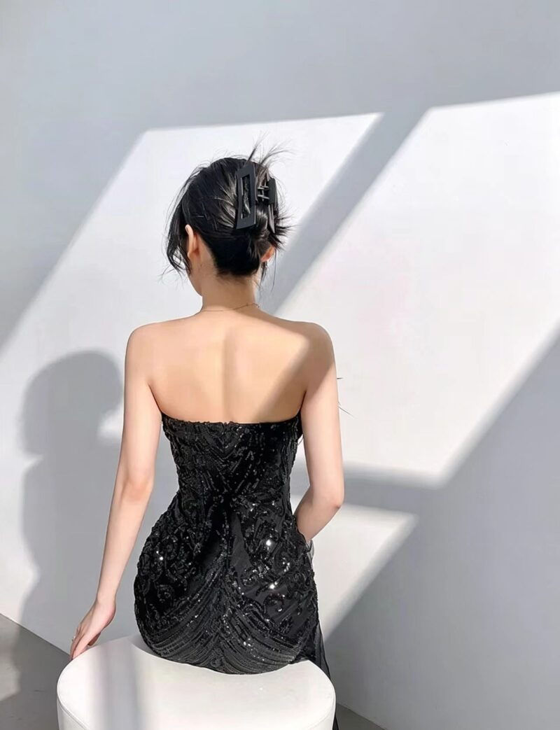 Black off-the-shoulder feather gown