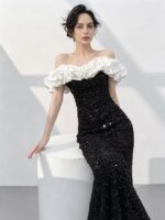 Off-the-shoulder white lace gown
