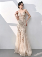 A shimmering, silver, mermaid-style gown