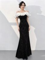 Off-the-shoulder white lace gown