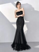 Black off-the-shoulder feather gown