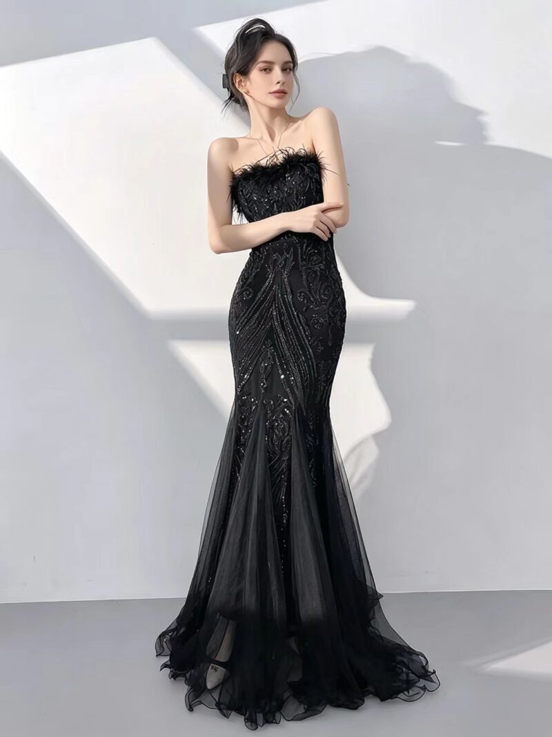 Black off-the-shoulder feather gown