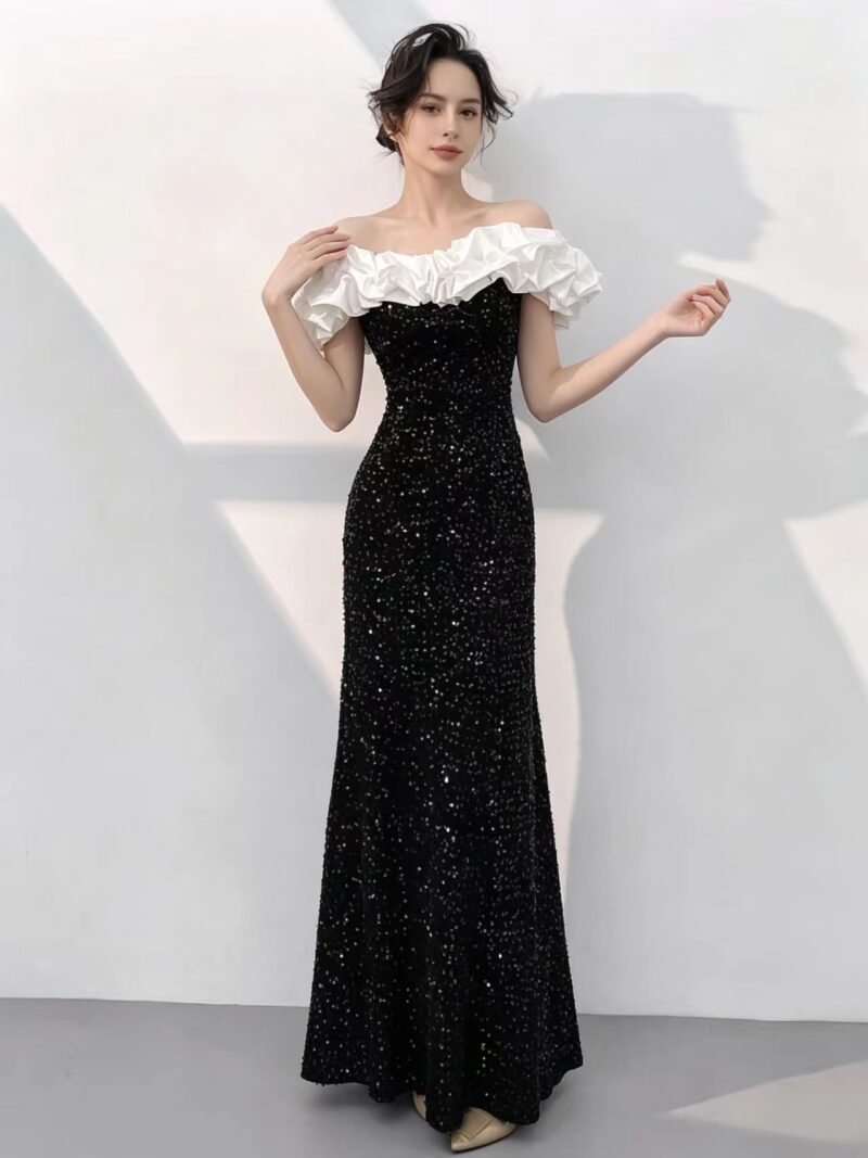 Off-the-shoulder white lace gown