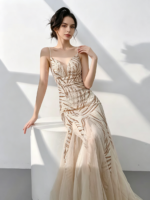 A shimmering, silver, mermaid-style gown