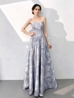 Printed strapless gown with a voluminous skirt